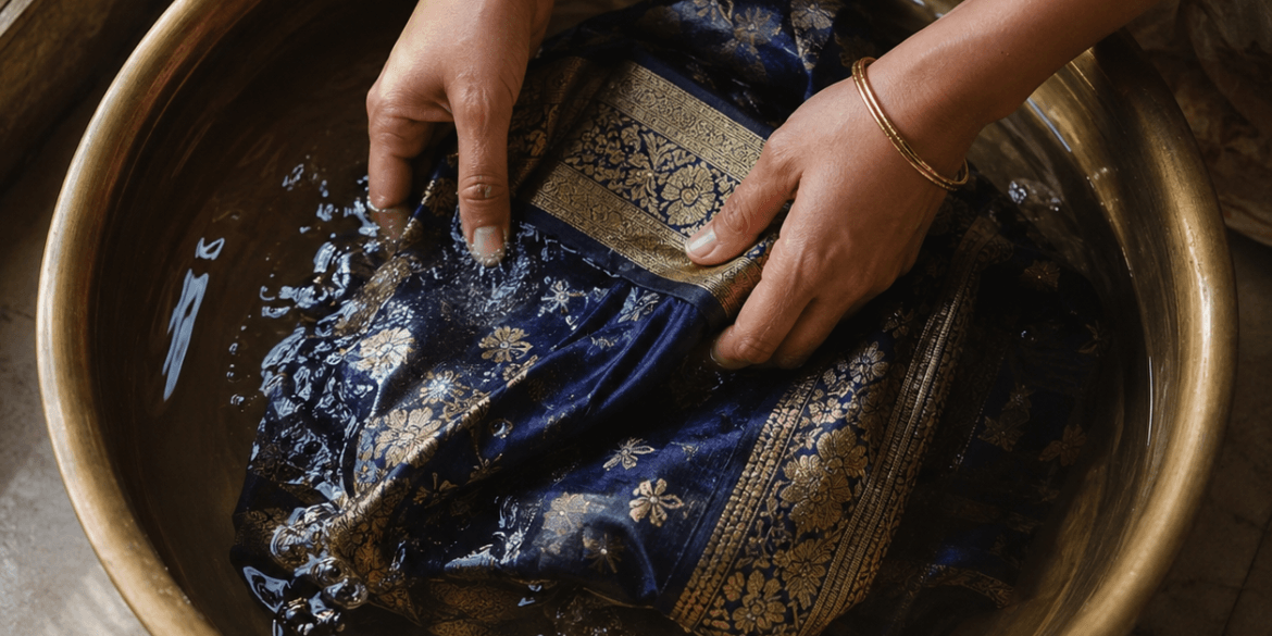 Hand-washing a silk saree in cold water at home