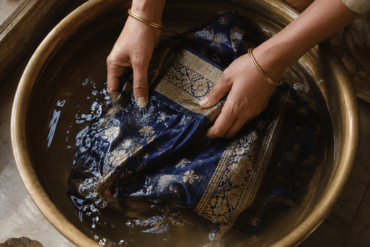 Hand-washing a silk saree in cold water at home