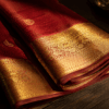 Kanjivaram silk saree in temple red with gold zari korvai border — Kanjivaram saree complete guide