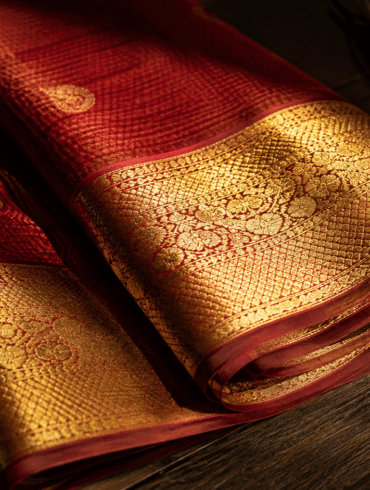 Kanjivaram silk saree in temple red with gold zari korvai border — Kanjivaram saree complete guide