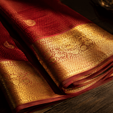 Kanjivaram silk saree in temple red with gold zari korvai border — Kanjivaram saree complete guide