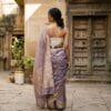 How to style a Banarasi saree — lilac organza draped with a corset and gold belt in Varanasi