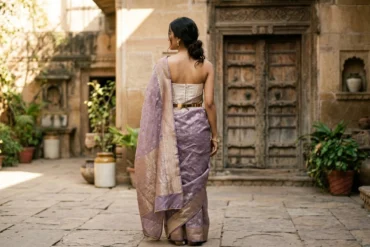 How to style a Banarasi saree — lilac organza draped with a corset and gold belt in Varanasi