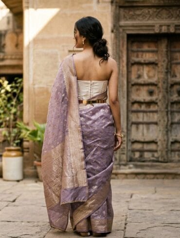 How to style a Banarasi saree — lilac organza draped with a corset and gold belt in Varanasi
