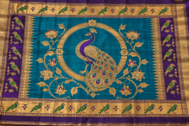 Authentic Paithani saree pallu with a woven peacock bangdi mor motif in gold zari on purple-turquoise silk